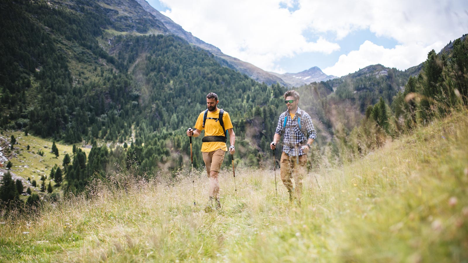 Two boys on a hike in nature at Santa Caterina Valfurva
